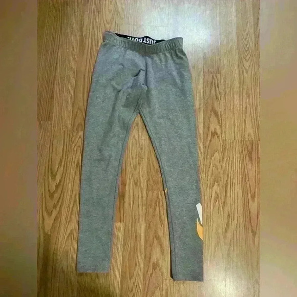 Nike leggings, women’s size small, gray with orange swoosh - Picture 1 of 4